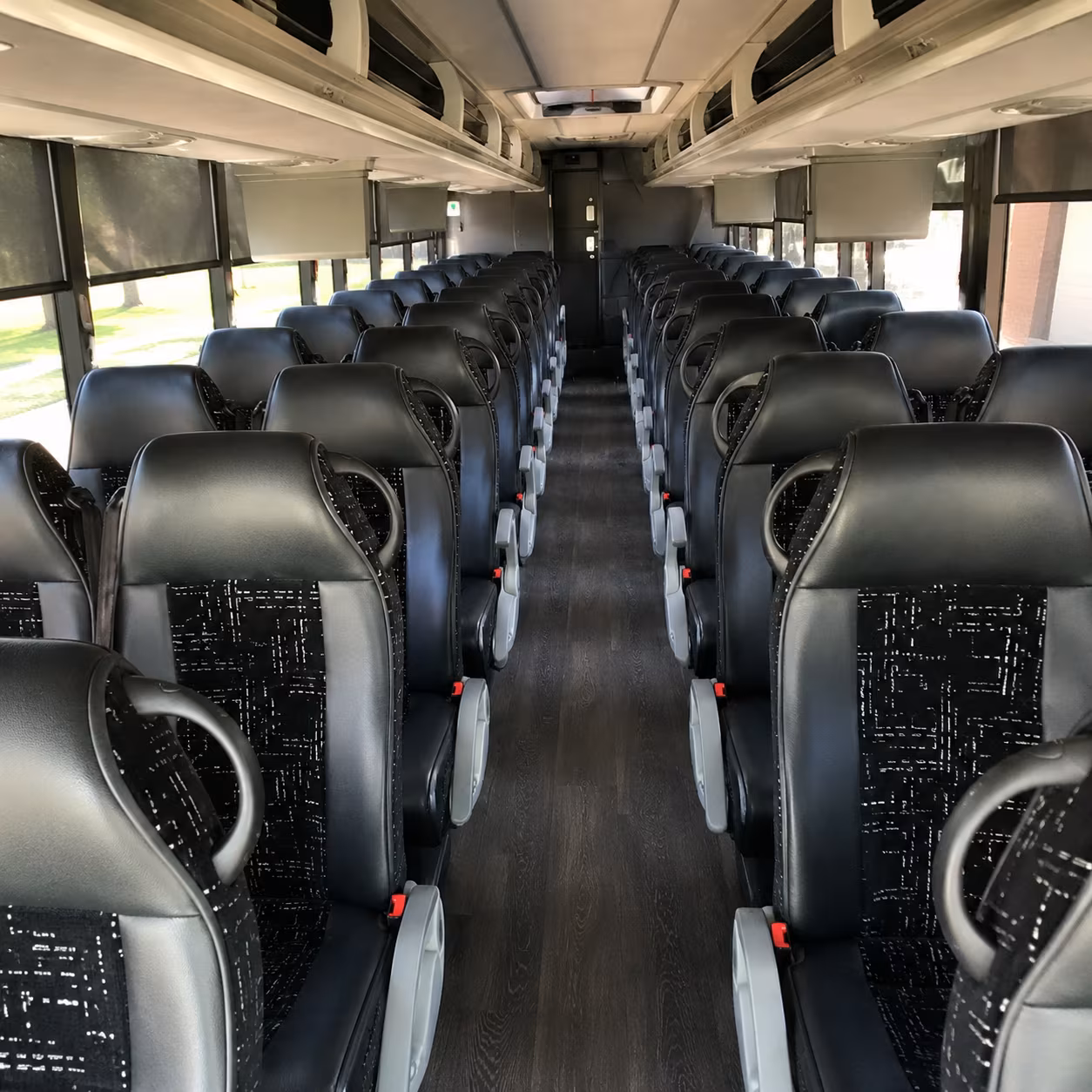 let a charter bus handle the i 10 so your team arrives ready
